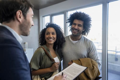 real estate broker signs new clients